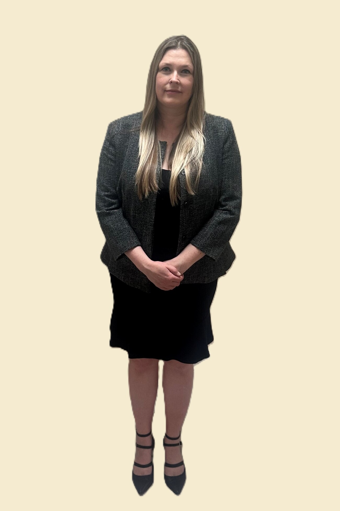 Joanna Kucz, partner, standing with an aggressive pose