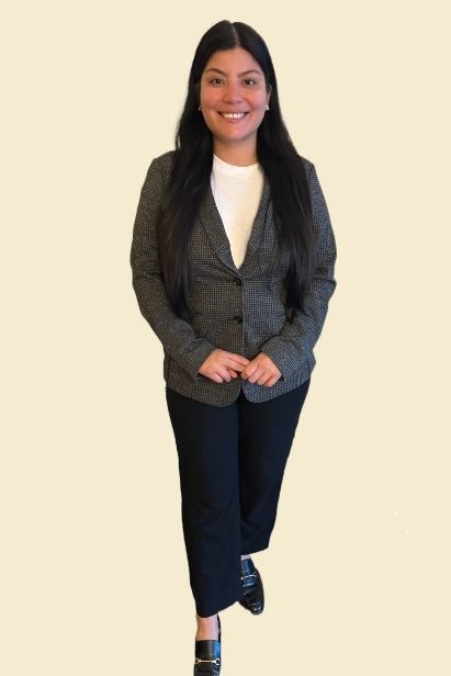 Samantha Touriz Maldonado, legal assistant, standing with an empathetic pose